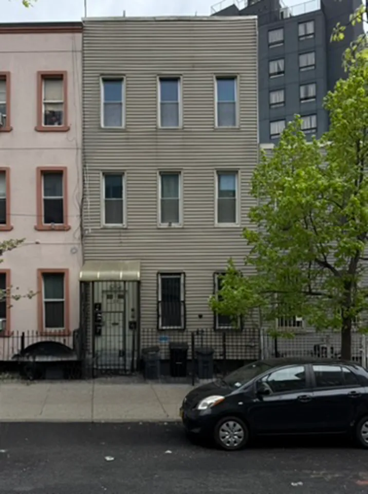 a car parked in front of a building