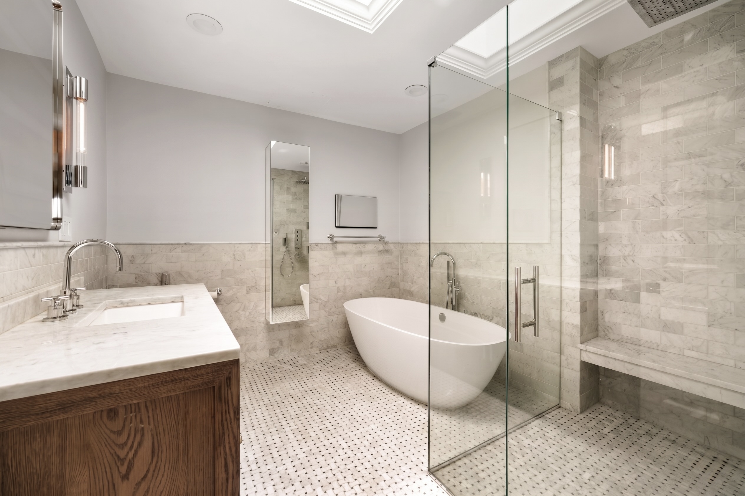 321 Commonwealth Avenue, Unit 40 Boston, MA 02115 - Photo 7 of 10 a bathroom with a sink and mirror