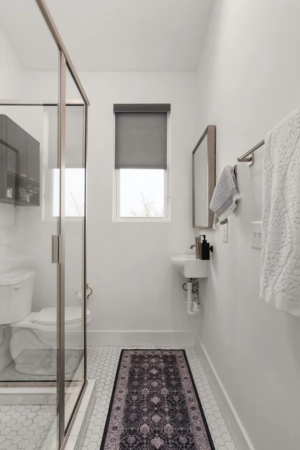 a bathroom with a sink and a shower