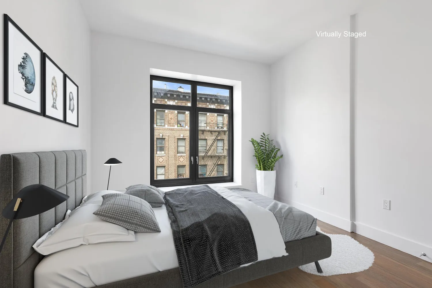 a bedroom with a large bed and a window