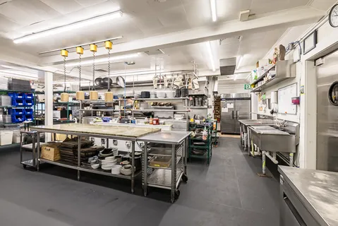 a large room with lots of wooden furniture