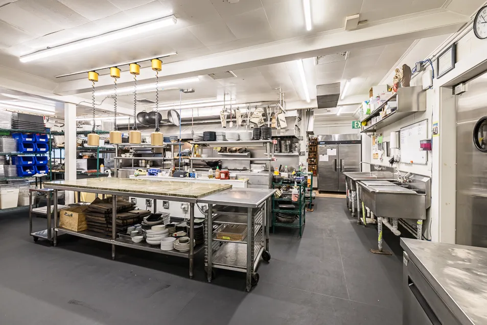 a large room with lots of wooden furniture