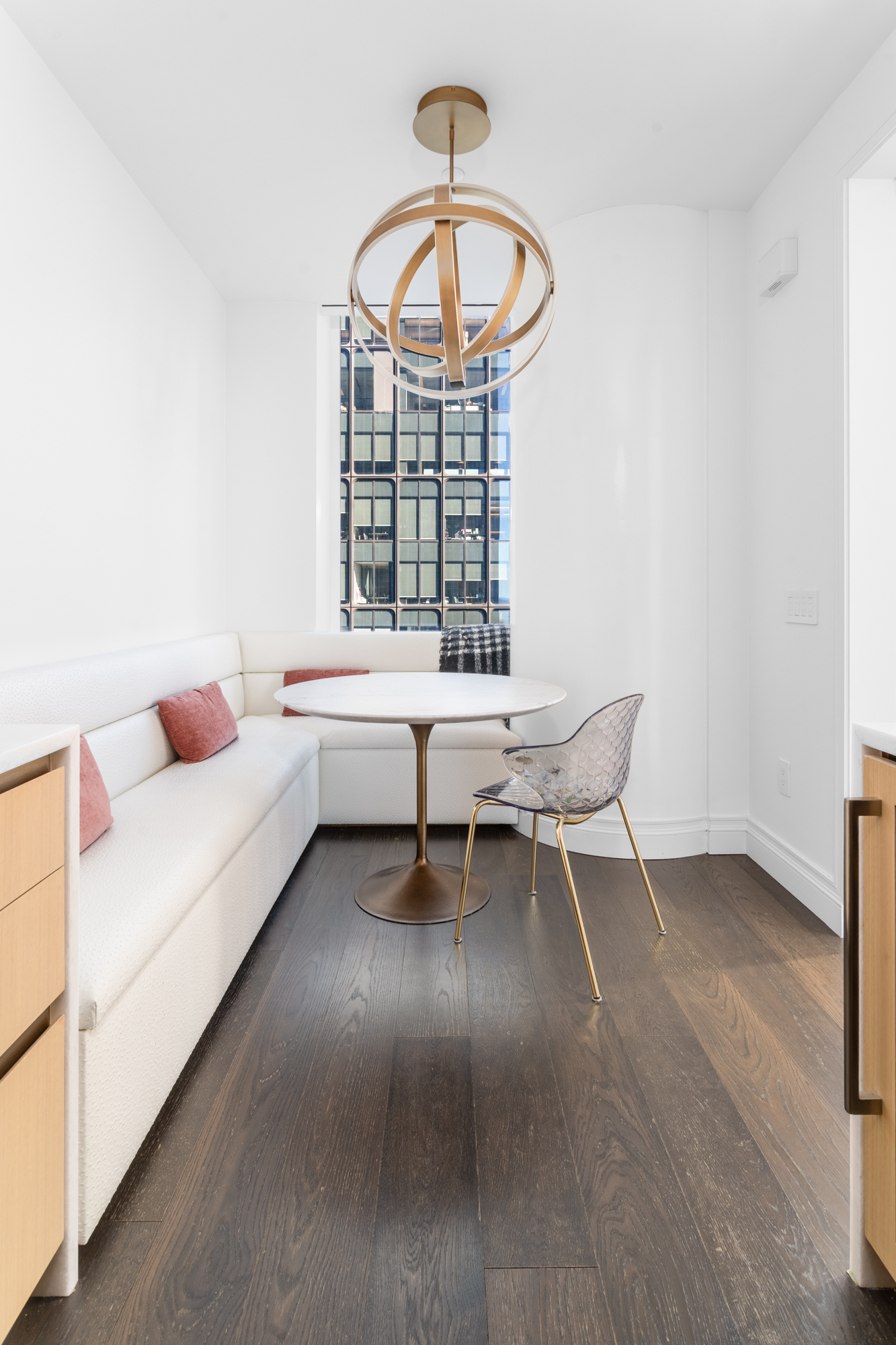 35 Hudson Yards, Unit 5903 Manhattan, NY 10001 - Photo 6 of 15 a living room with furniture and a window