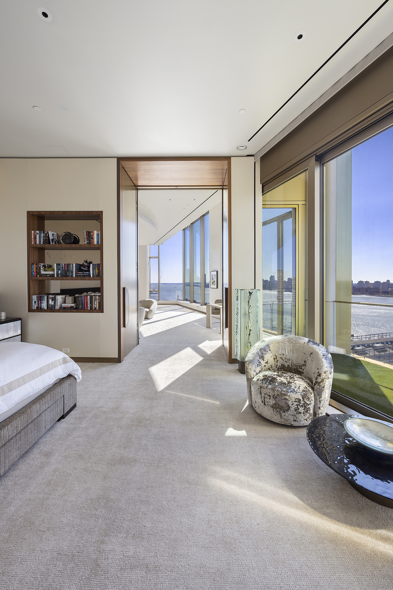 551 West 21st Street, Unit PH Manhattan, NY 10011 - Photo 24 of 51 a spacious bedroom with a bed and a large window