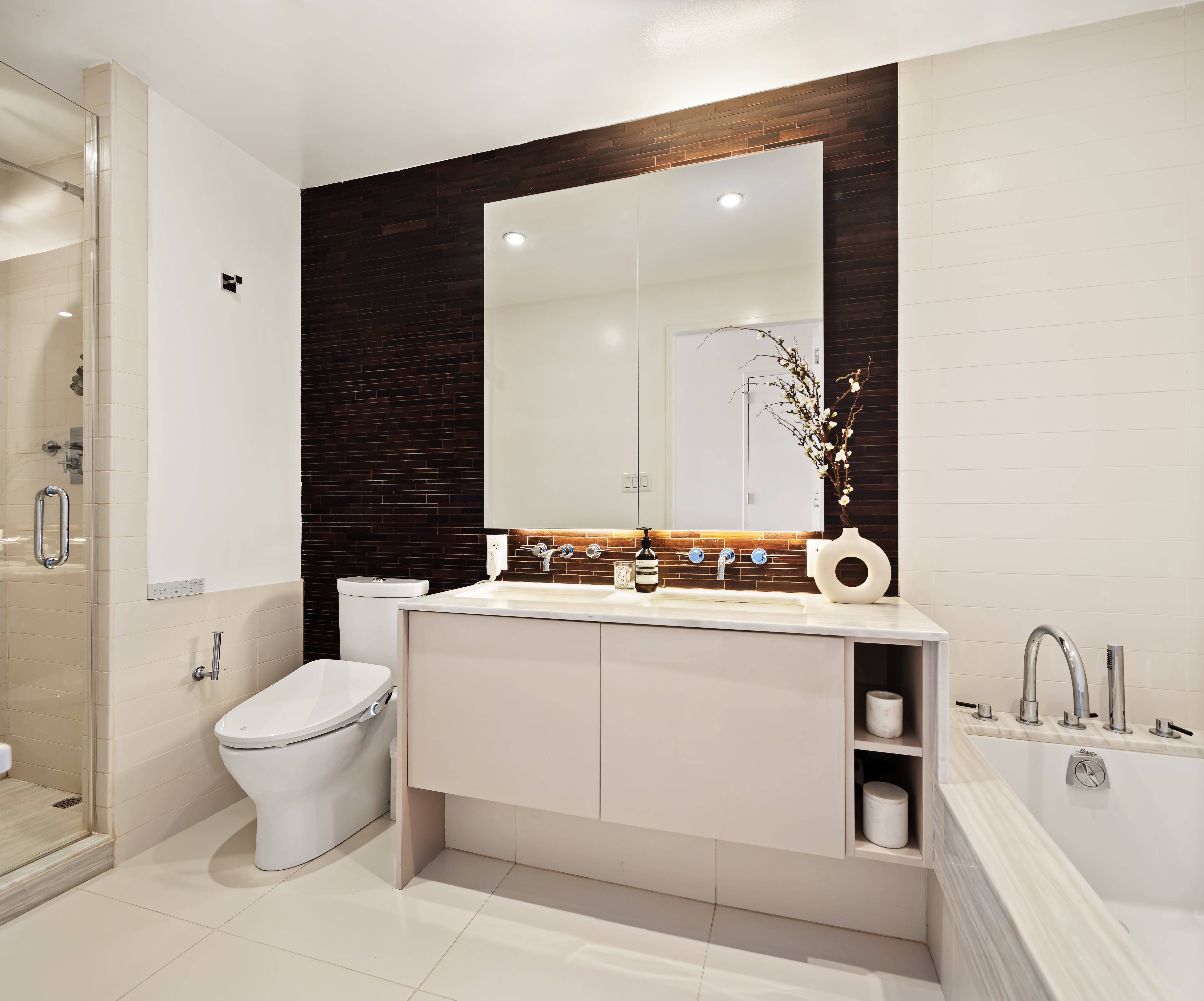 2 Northside Piers, Unit 8A Brooklyn, NY 11249 - Photo 6 of 11 a bathroom with a sink and mirror with toilet