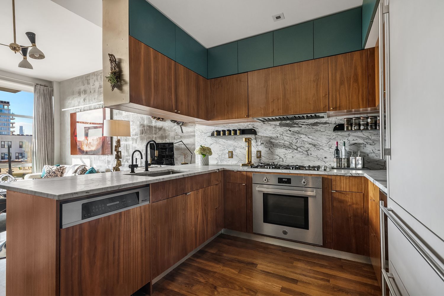 280 Metropolitan Avenue, Unit 5D Brooklyn, NY 11211 - Photo 3 of 22 a kitchen with stainless steel appliances granite countertop a stove and a sink
