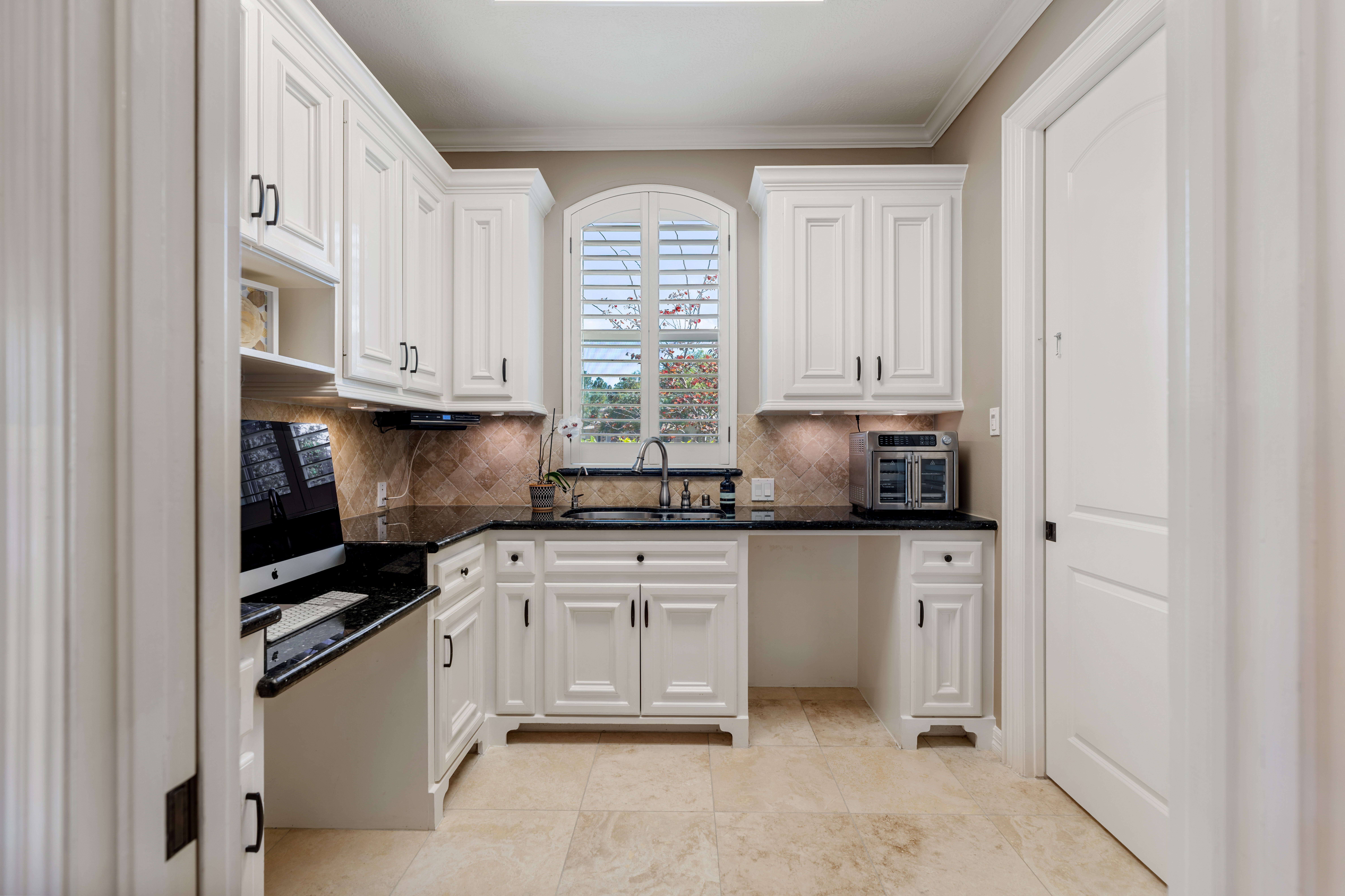 82 Manor Lake Estates Circle Spring, TX 77379 - Photo 19 of 52 a kitchen with stainless steel appliances granite countertop a stove sink and cabinets