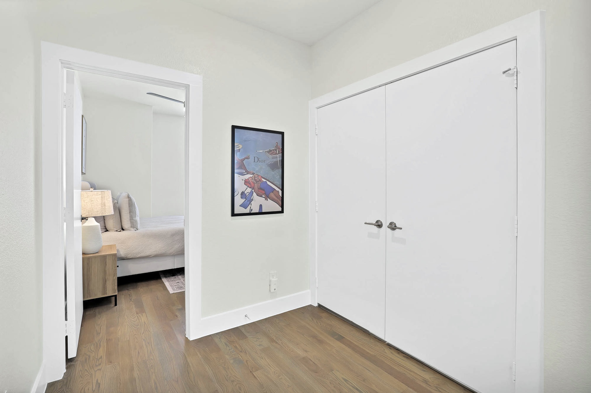 3920 Riesling Ridge Dallas, TX 75204 - Photo 11 of 26 a view of a bedroom with wooden floor