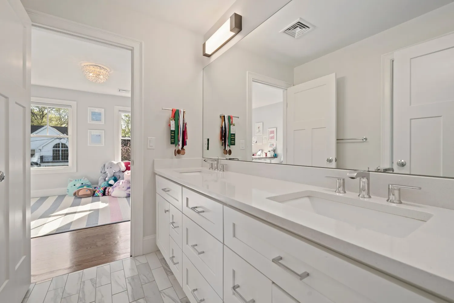 a living room with furniture and windows