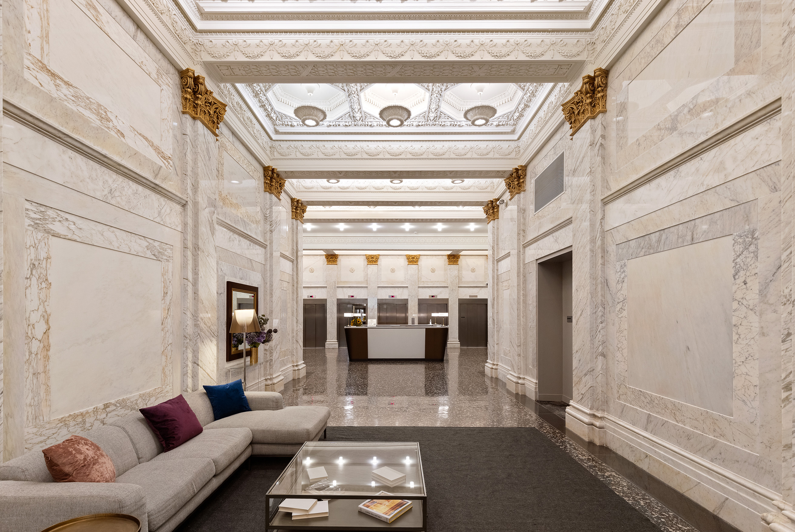 25 Broad Street, Unit 6T Manhattan, NY 10004 - Photo 12 of 13 a living room with furniture and a ceiling fan