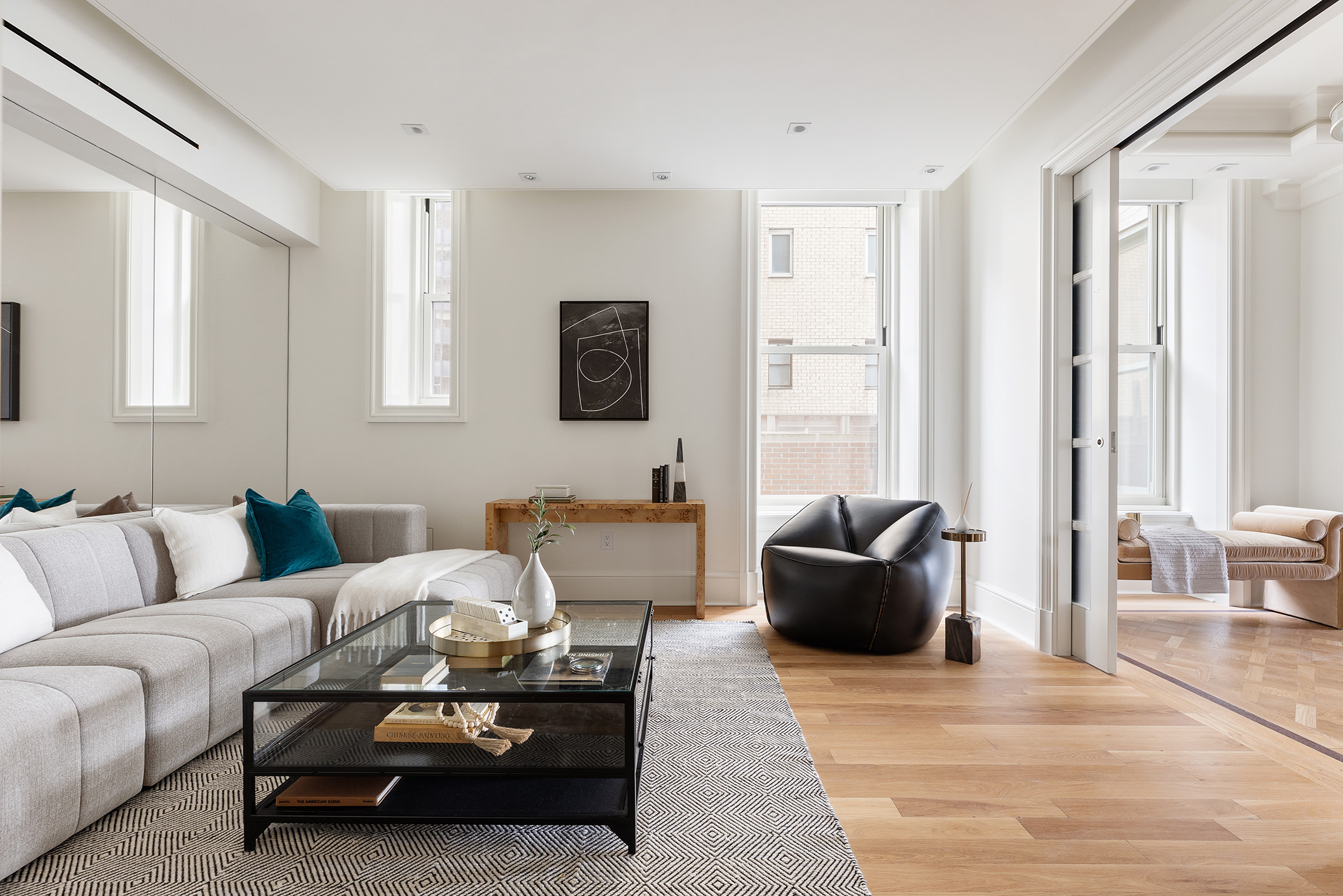 1 Central Park South, Unit 8010203 Manhattan, NY 10019 - Photo 24 of 45 a living room with furniture and a large window