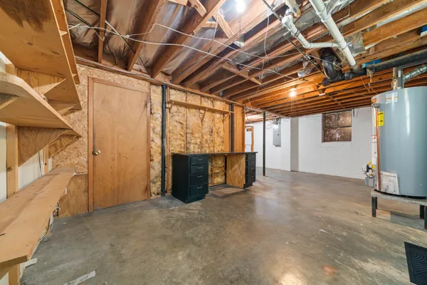 a view of a room with wooden walls