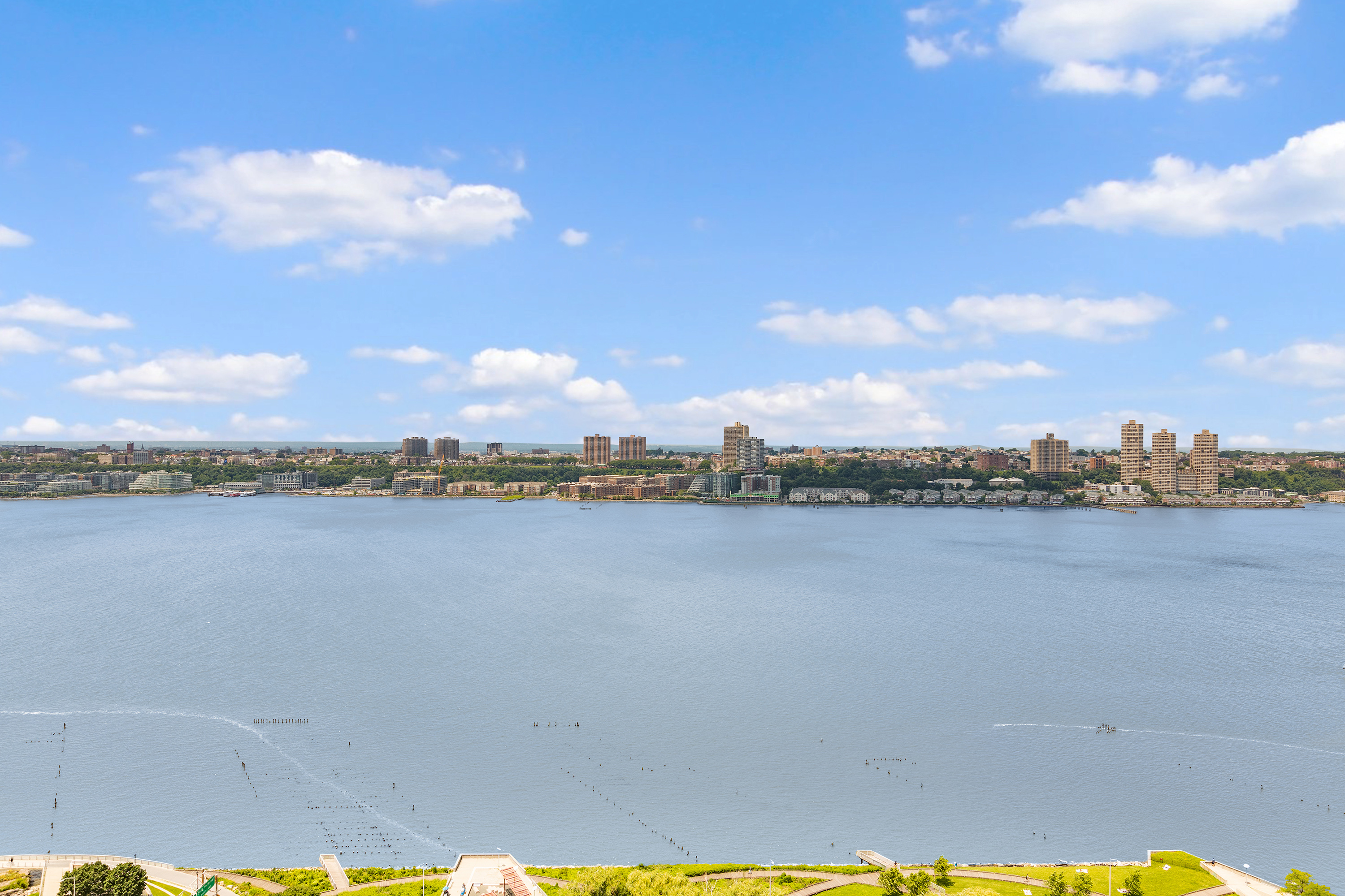 100 Riverside Boulevard, Unit 29C Manhattan, NY 10069 - Photo 4 of 15 a view of a lake with a city