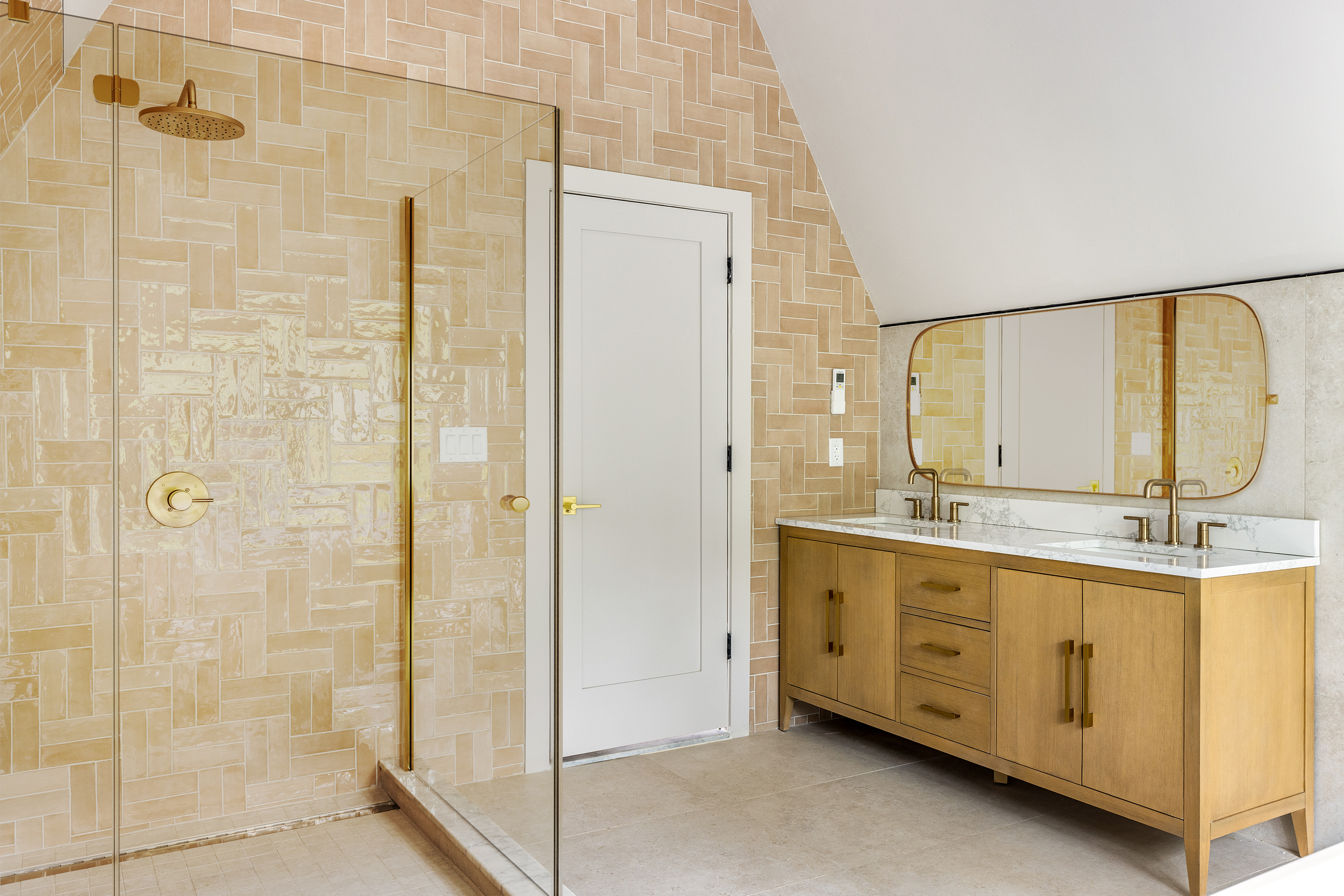 697 East 21st Street Brooklyn, NY 11210 - Photo 10 of 18 a bathroom with a double vanity sink a toilet and a glass door