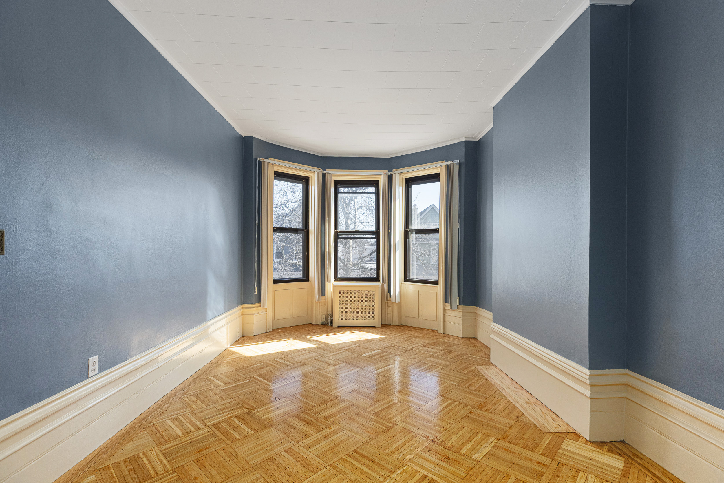 304 East 8th Street Brooklyn, NY 11218 - Photo 14 of 32 a view of an empty room with a window