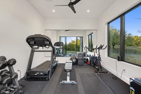 a view of a room with gym equipment