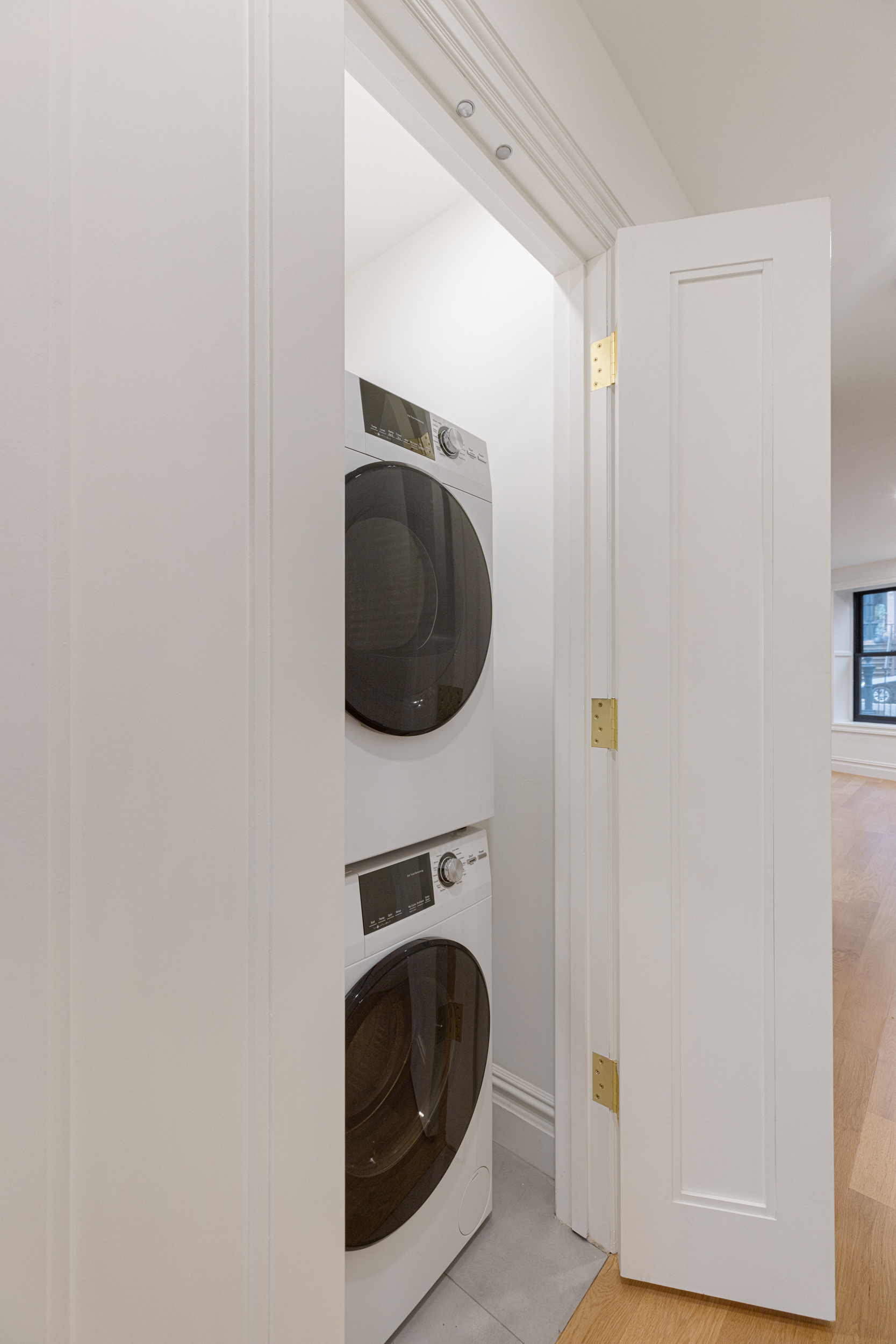 15 Verona Place, Unit GARDEN Brooklyn, NY 11216 - Photo 10 of 14 a utility room with dryer and washer