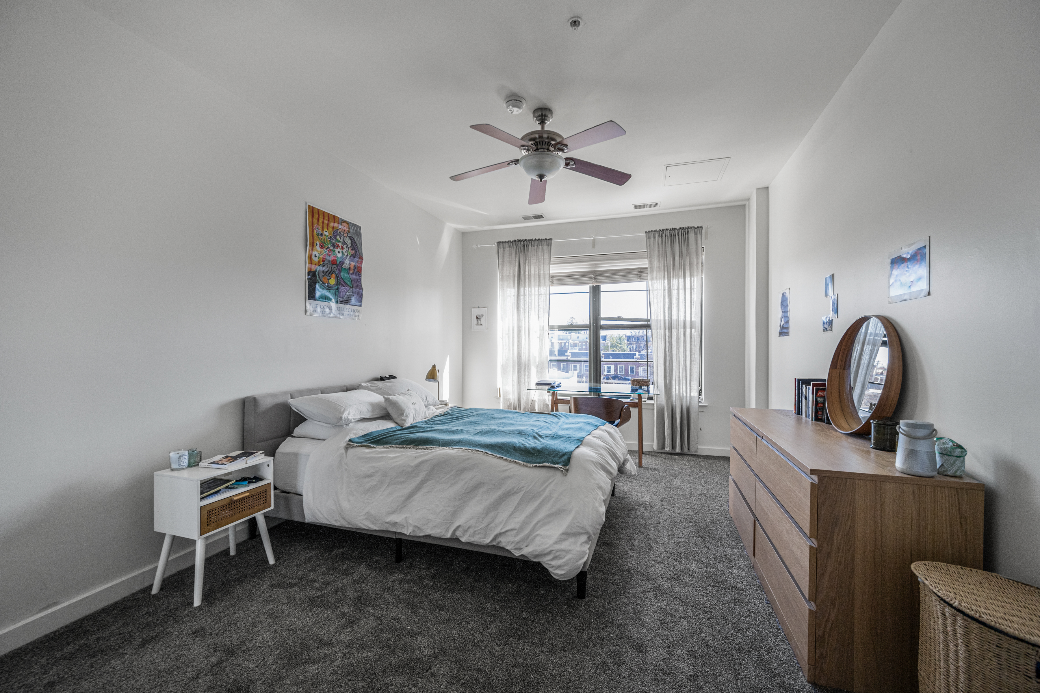 3201 St Paul Street, Unit 310 Baltimore, MD 21218 - Photo 3 of 20 a bed room with a bed and a window