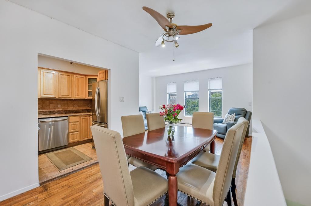 57 Carroll Street, Unit 38A Brooklyn, NY 11231 - Photo 12 of 21 a view of a dining room with furniture and wooden floor