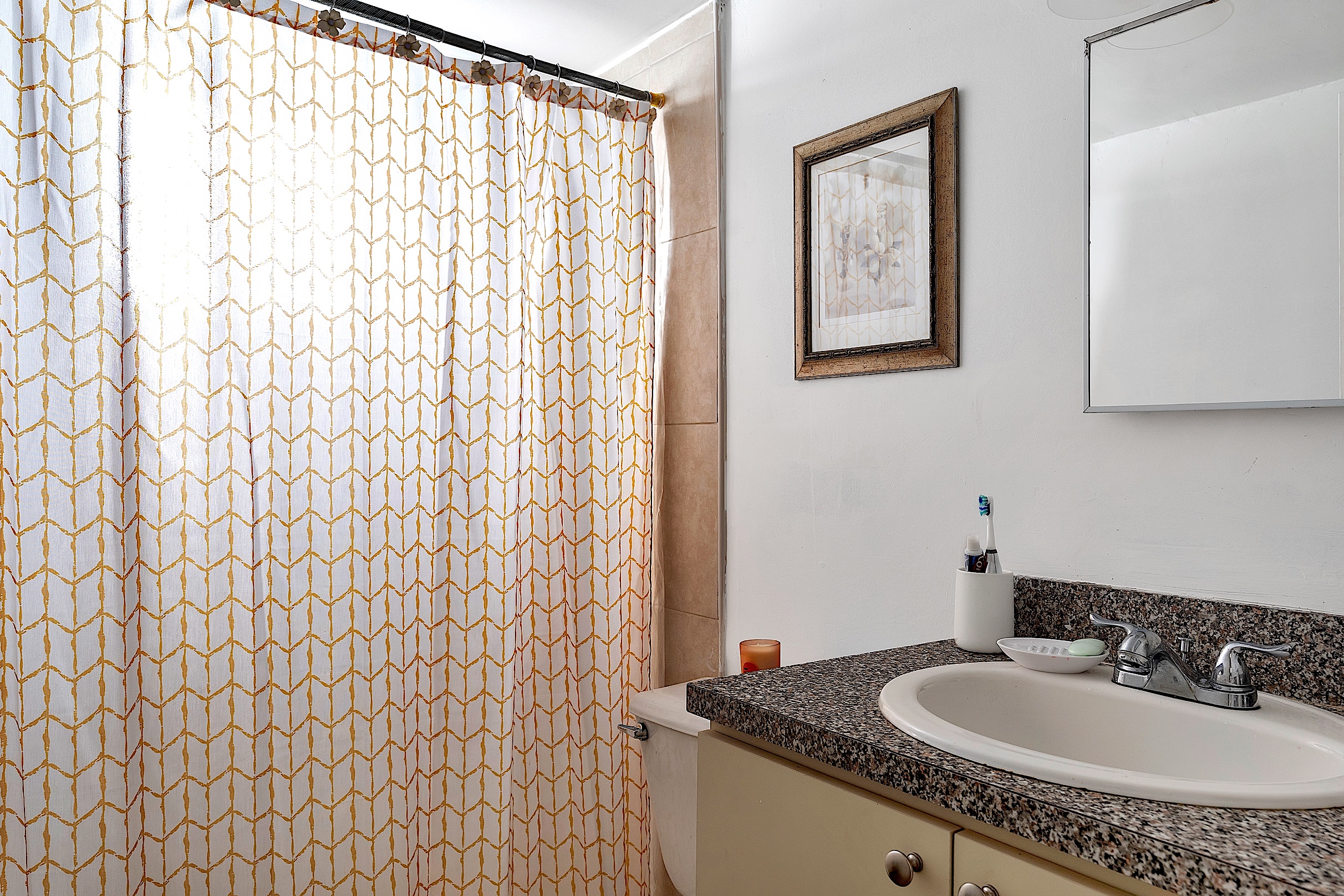 1361 Southwest 4th Street Miami, FL 33135 - Photo 13 of 23 a bathroom with a granite countertop sink and a mirror