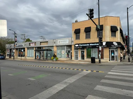 a view of a building with a street