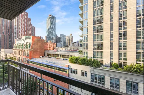 a view of a balcony with city view
