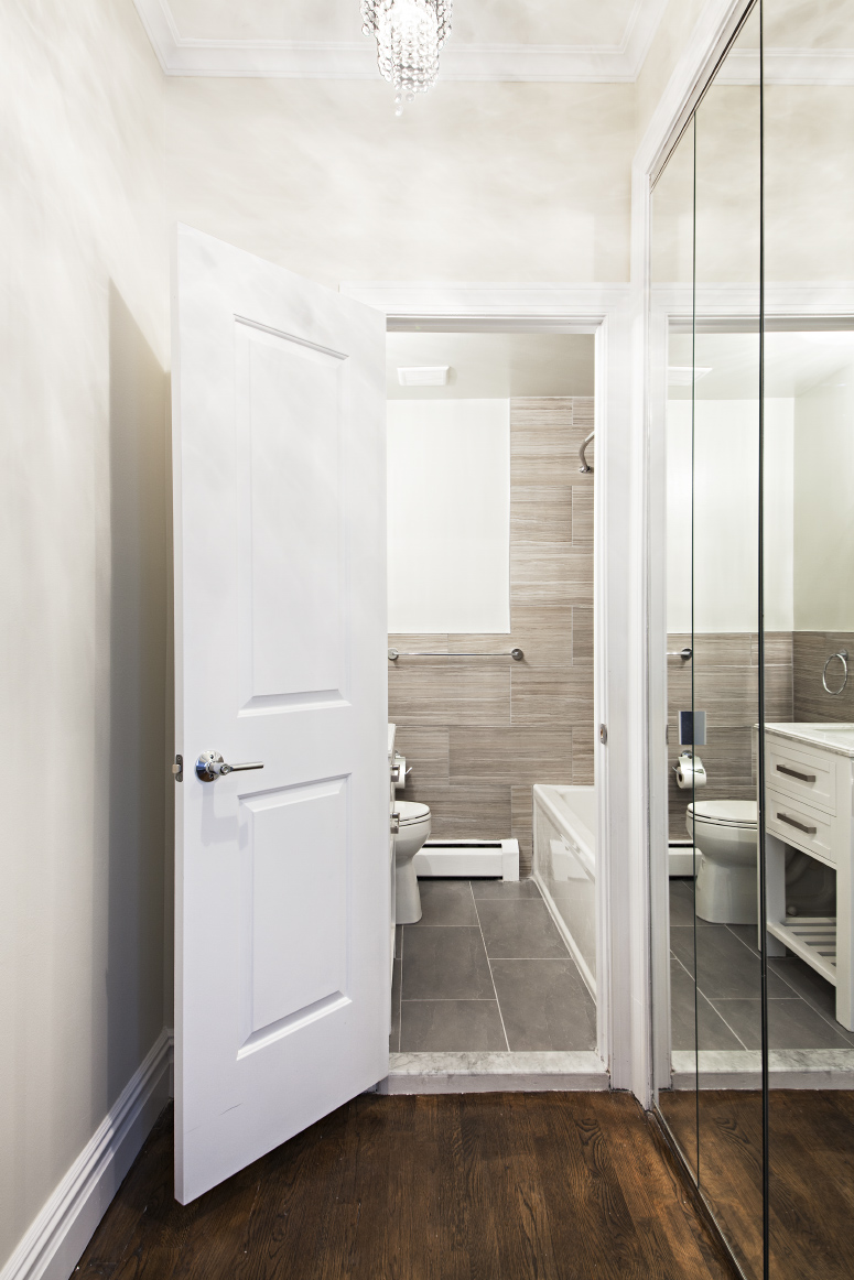 442 Amsterdam Avenue, Unit 4C Manhattan, NY 10024 - Photo 6 of 9 a bathroom with a tub and shower