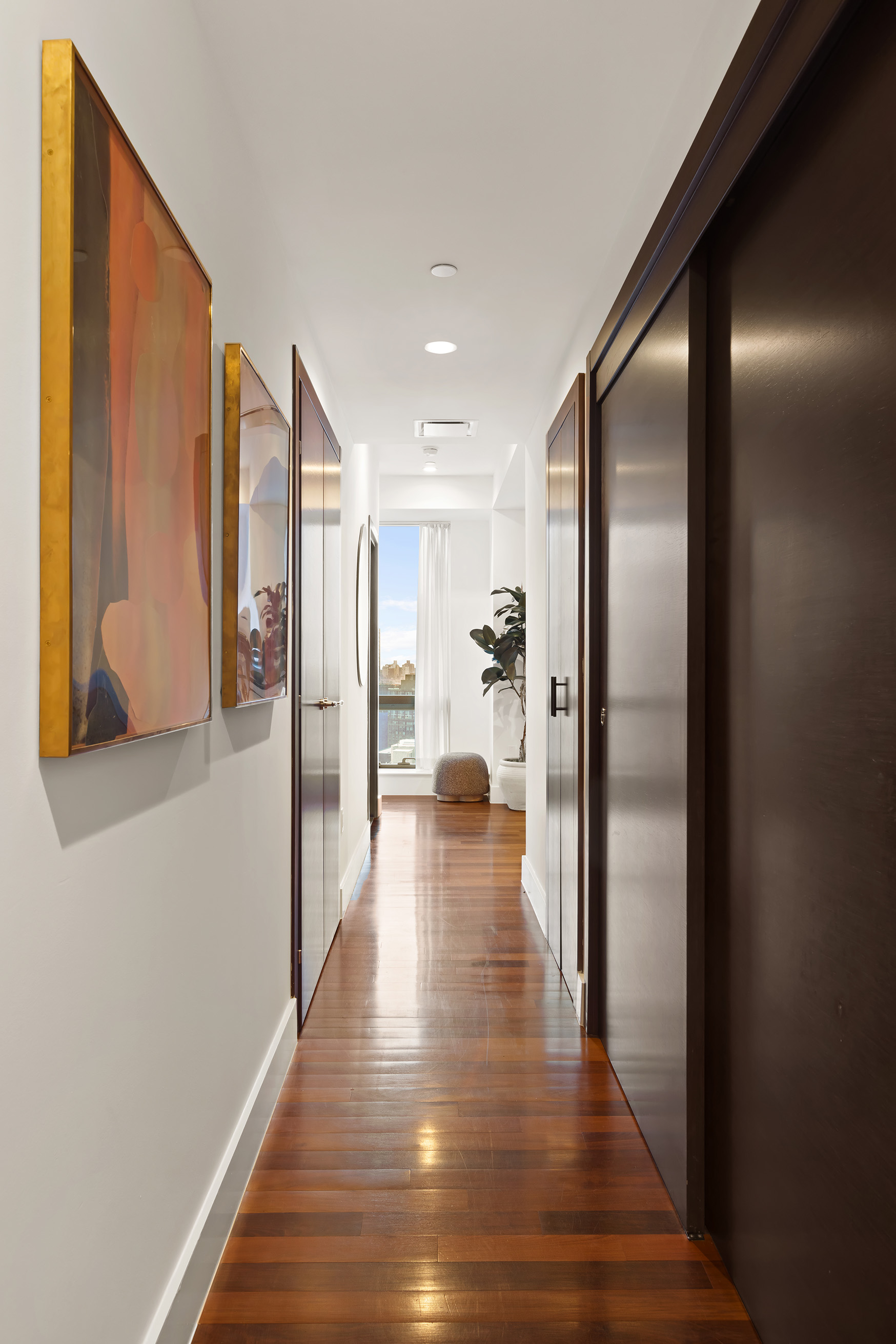 150 Myrtle Avenue, Unit 2506 Brooklyn, NY 11201 - Photo 11 of 16 a view of a hallway with wooden floor
