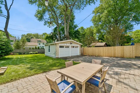 a view of a backyard with a patio