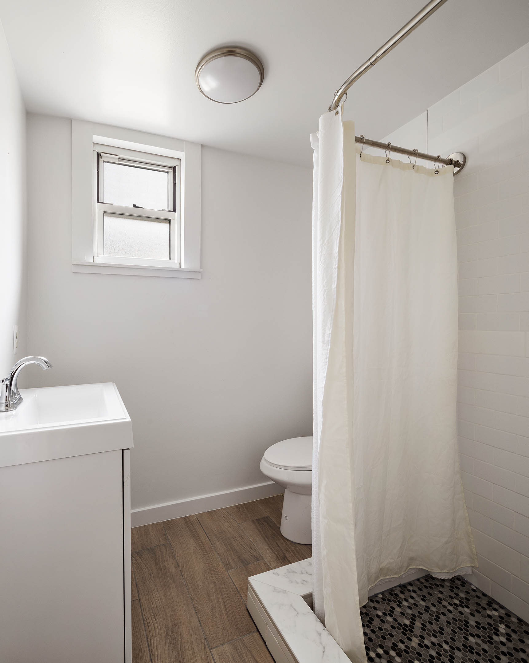 267 Marlborough Road Brooklyn, NY 11226 - Photo 9 of 14 a bathroom with a sink toilet and shower