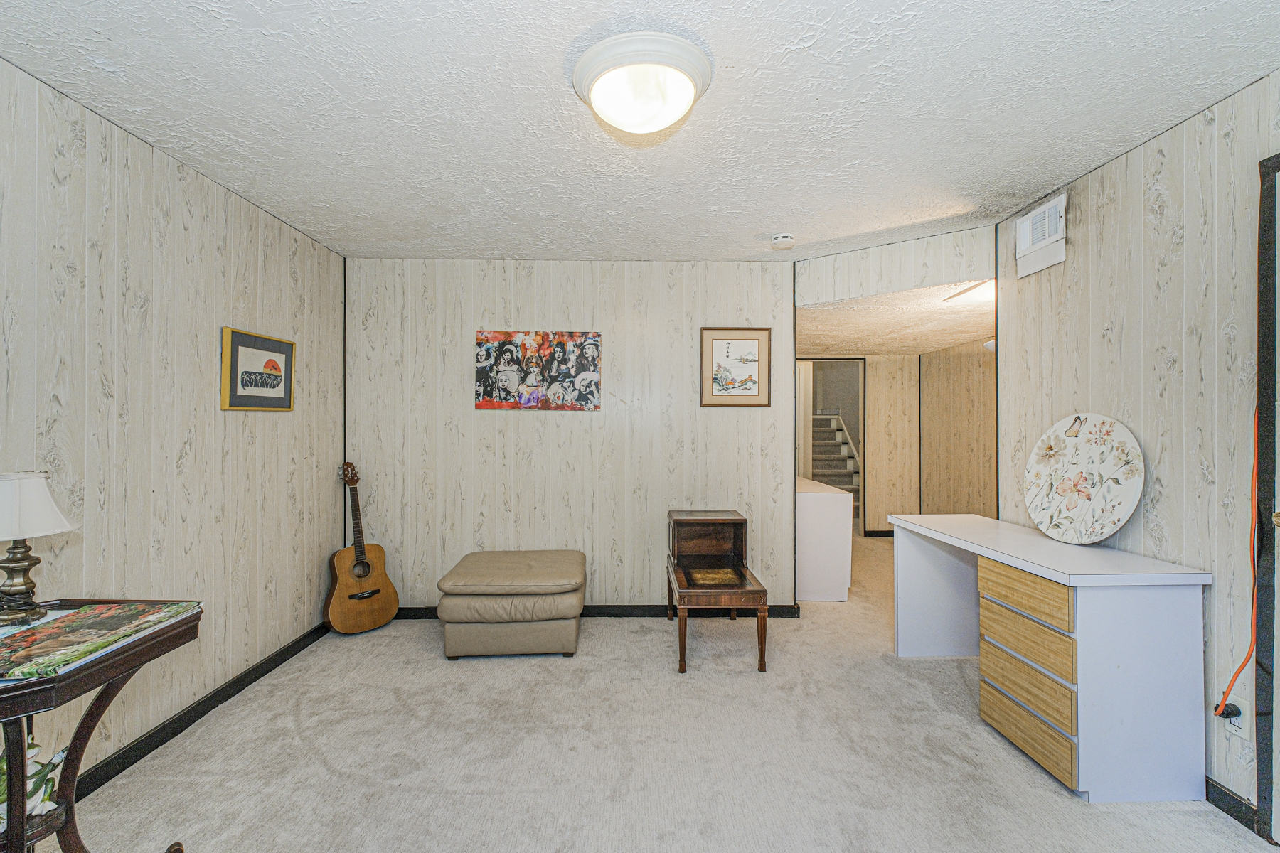 97 Dogwood Lane Staten Island, NY 10305 - Photo 14 of 22 a living room with furniture a rug and a window