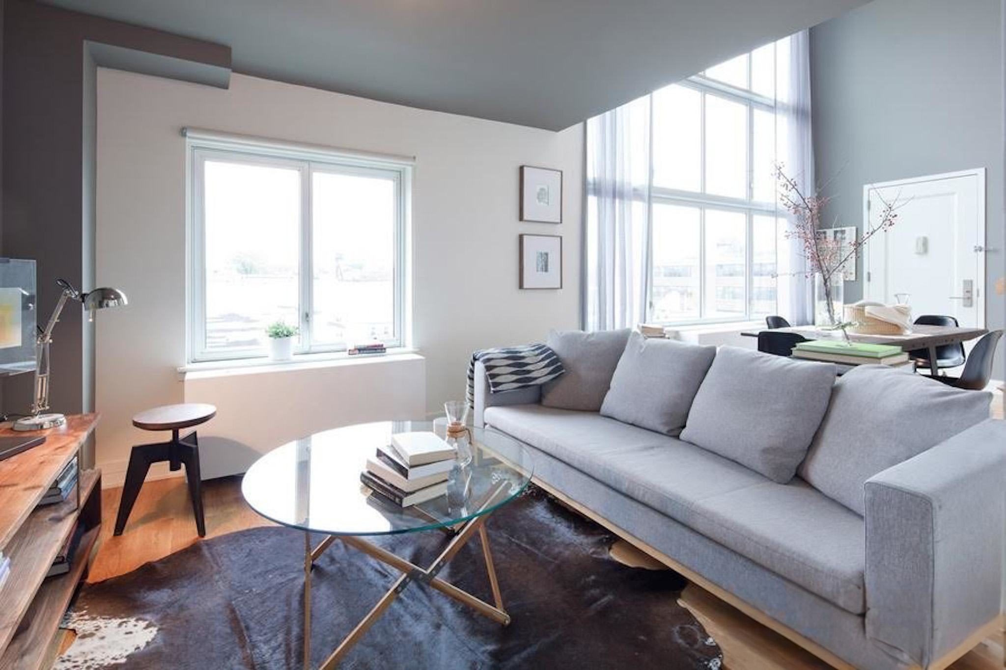 224 Wythe Avenue, Unit 68E Brooklyn, NY 11249 - Photo 2 of 10 a living room with furniture and a window