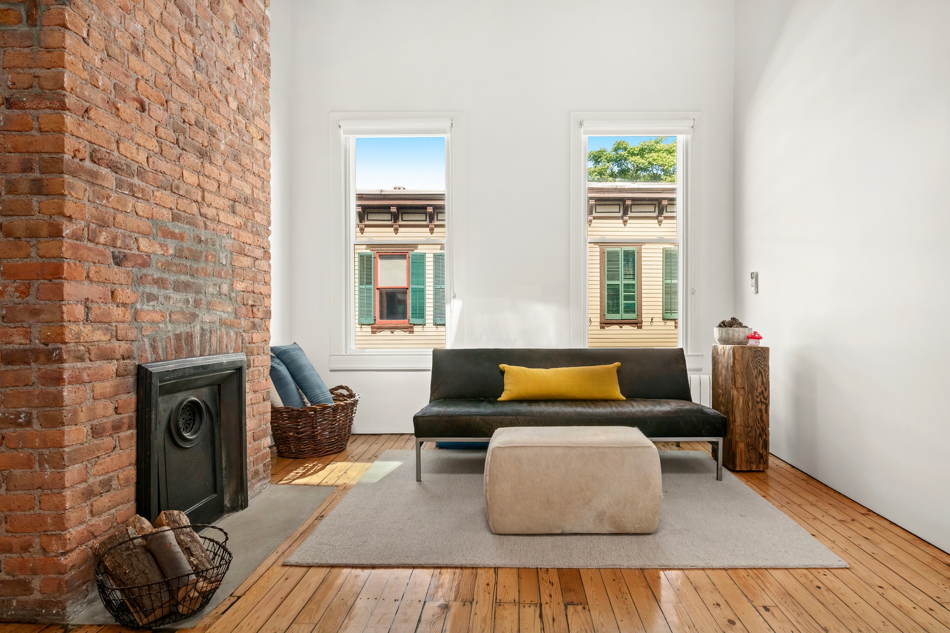 8 Sylvan Terrace Manhattan, NY 10032 - Photo 13 of 19 a living room with furniture and a fireplace