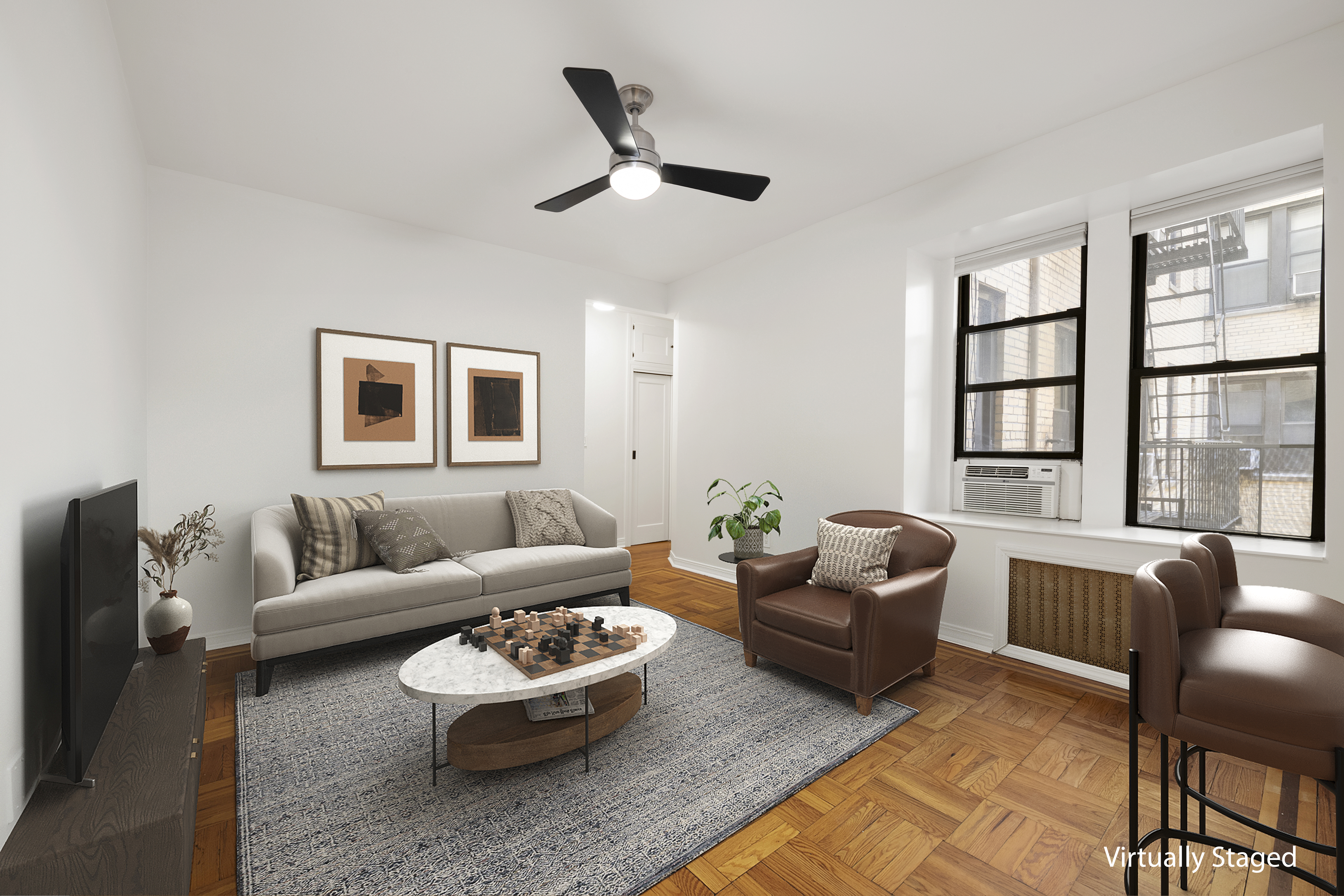67 Morton Street, Unit 2A Manhattan, NY 10014 - Photo 1 of 10 a living room with furniture and a large window