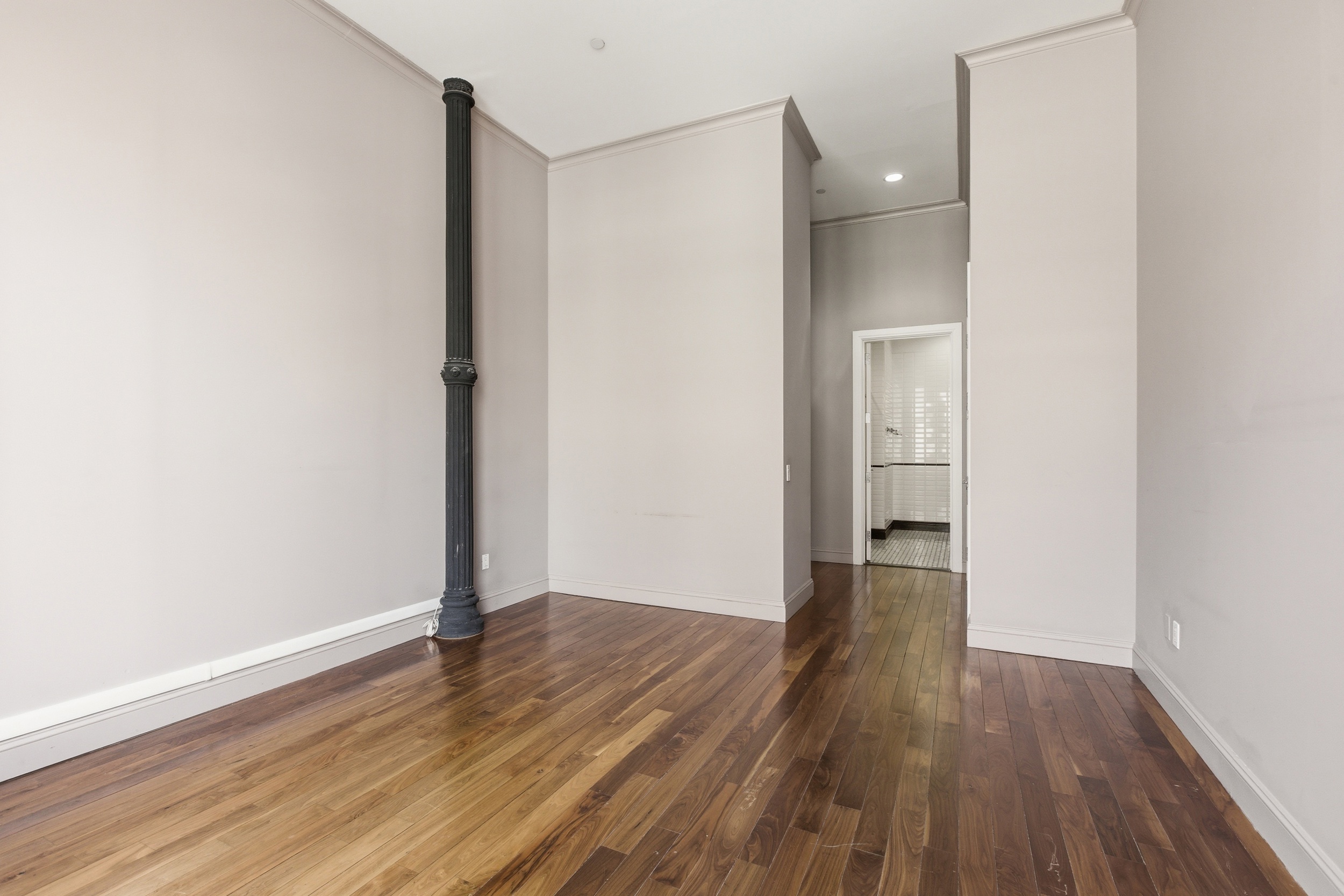 655 6th Avenue, Unit 3D Manhattan, NY 10010 - Photo 11 of 20 a view of wooden floor in an empty room