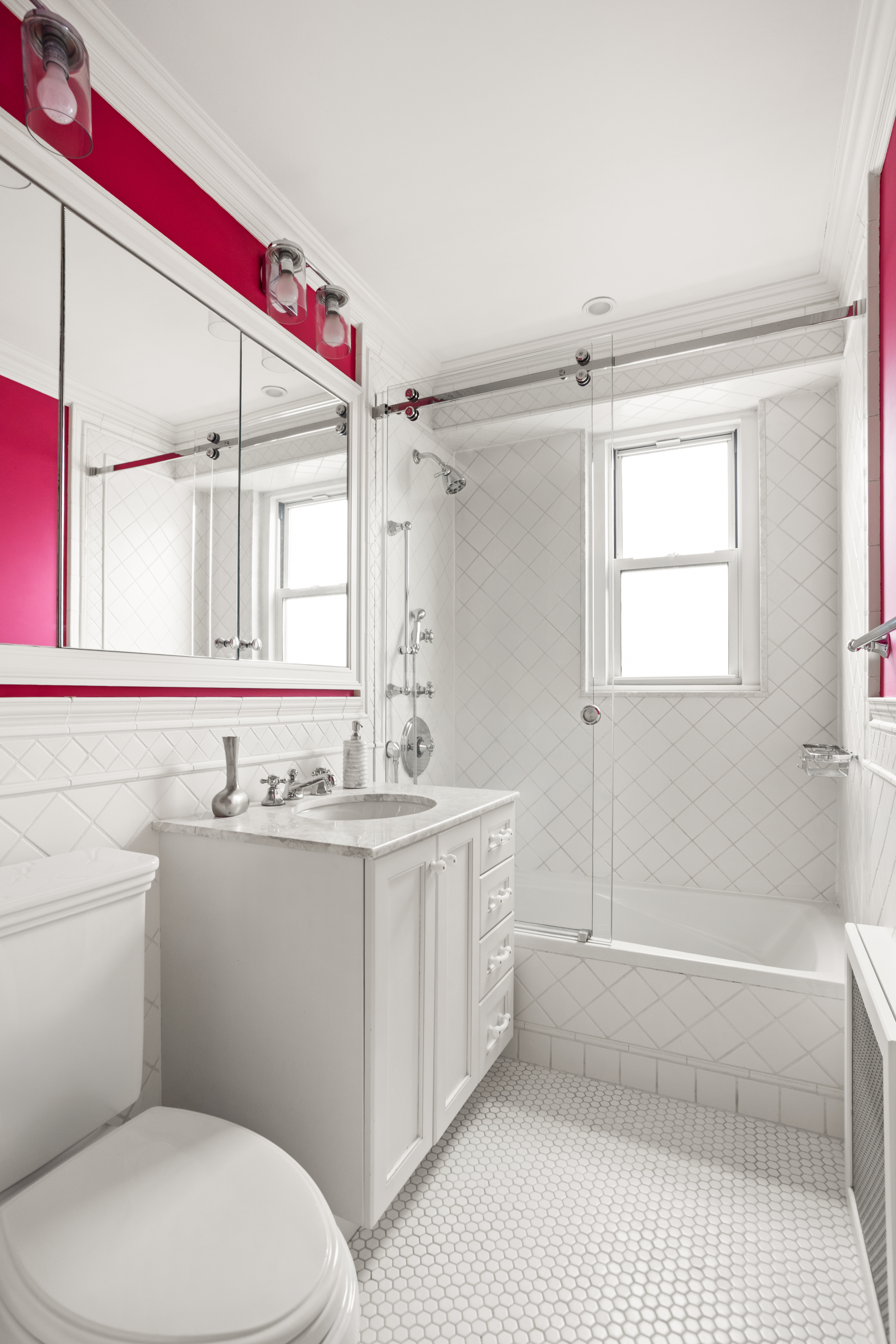 60 East End Avenue, Unit 12C Manhattan, NY 10028 - Photo 13 of 27 a bathroom with a sink a toilet and shower