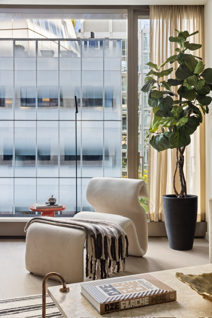 500 West 18th Street, Unit WEST 5E Manhattan, NY 10011 - Photo 9 of 15 a bedroom with a bed and a potted plant