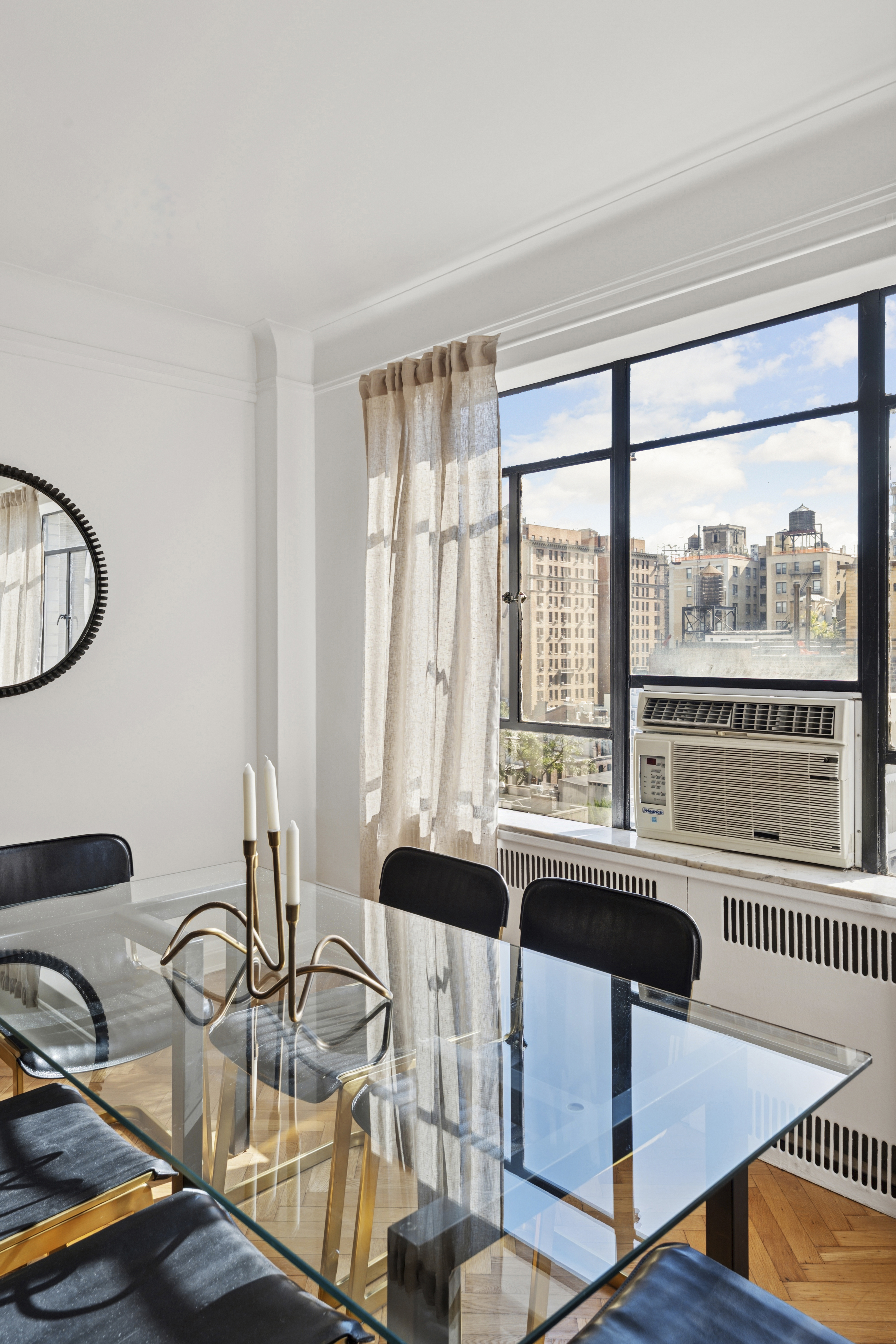 140 Riverside Drive, Unit 10N Manhattan, NY 10024 - Photo 5 of 21 a dining room with furniture and wooden floor