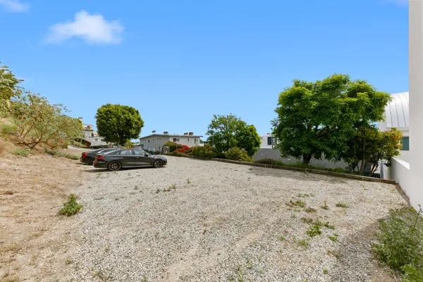 a view of a backyard of a house