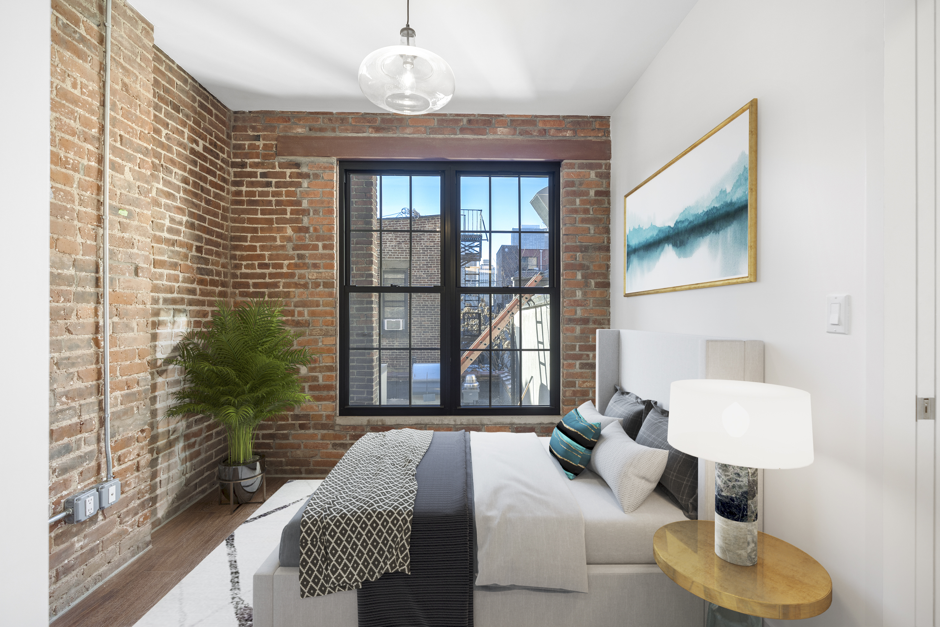 406 West 52nd Street, Unit 2 Manhattan, NY 10019 - Photo 4 of 9 a living room with furniture and a large window