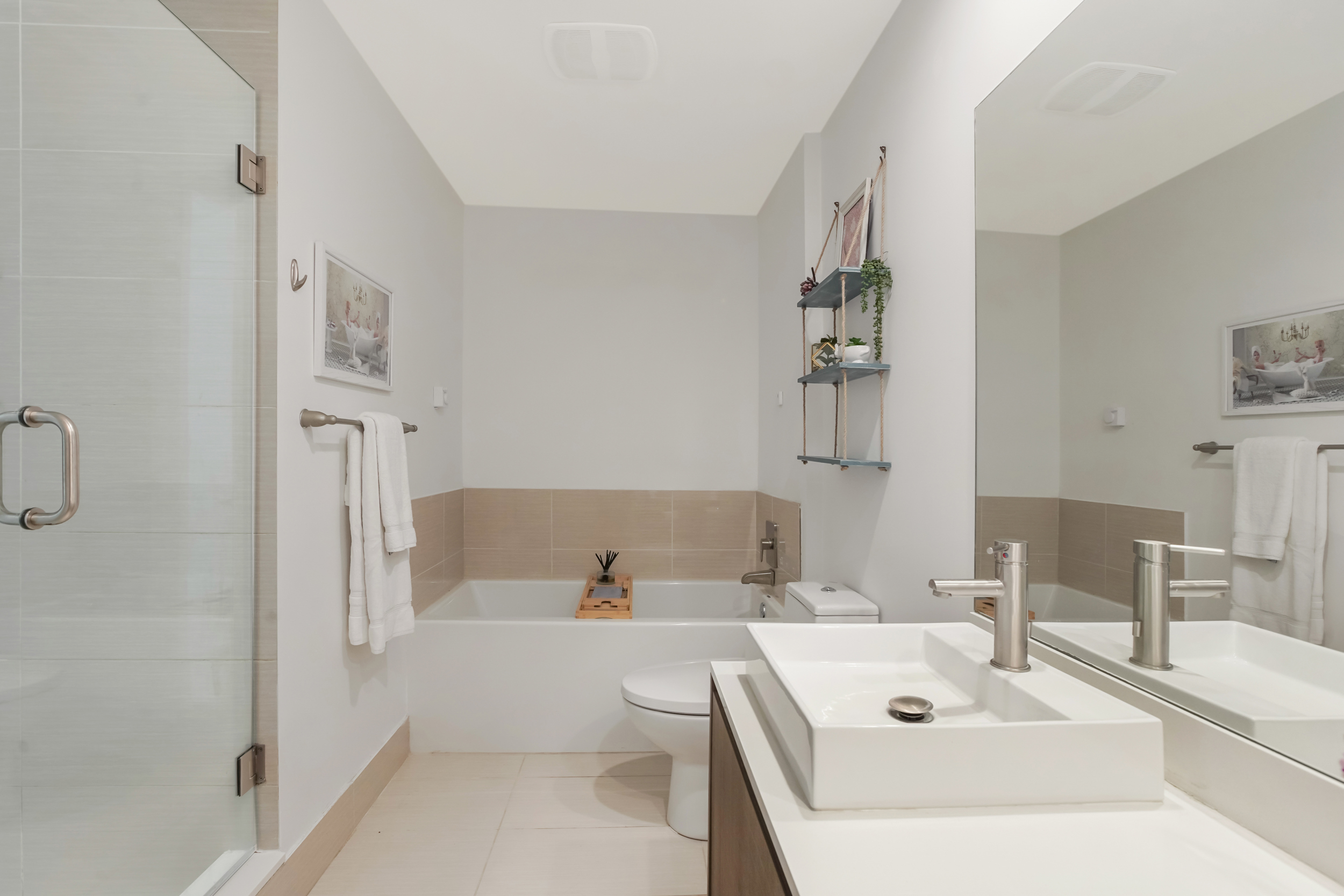 201 Southwest 17th Road, Unit 311 Miami, FL 33129 - Photo 15 of 21 a bathroom with a tub sink and mirror