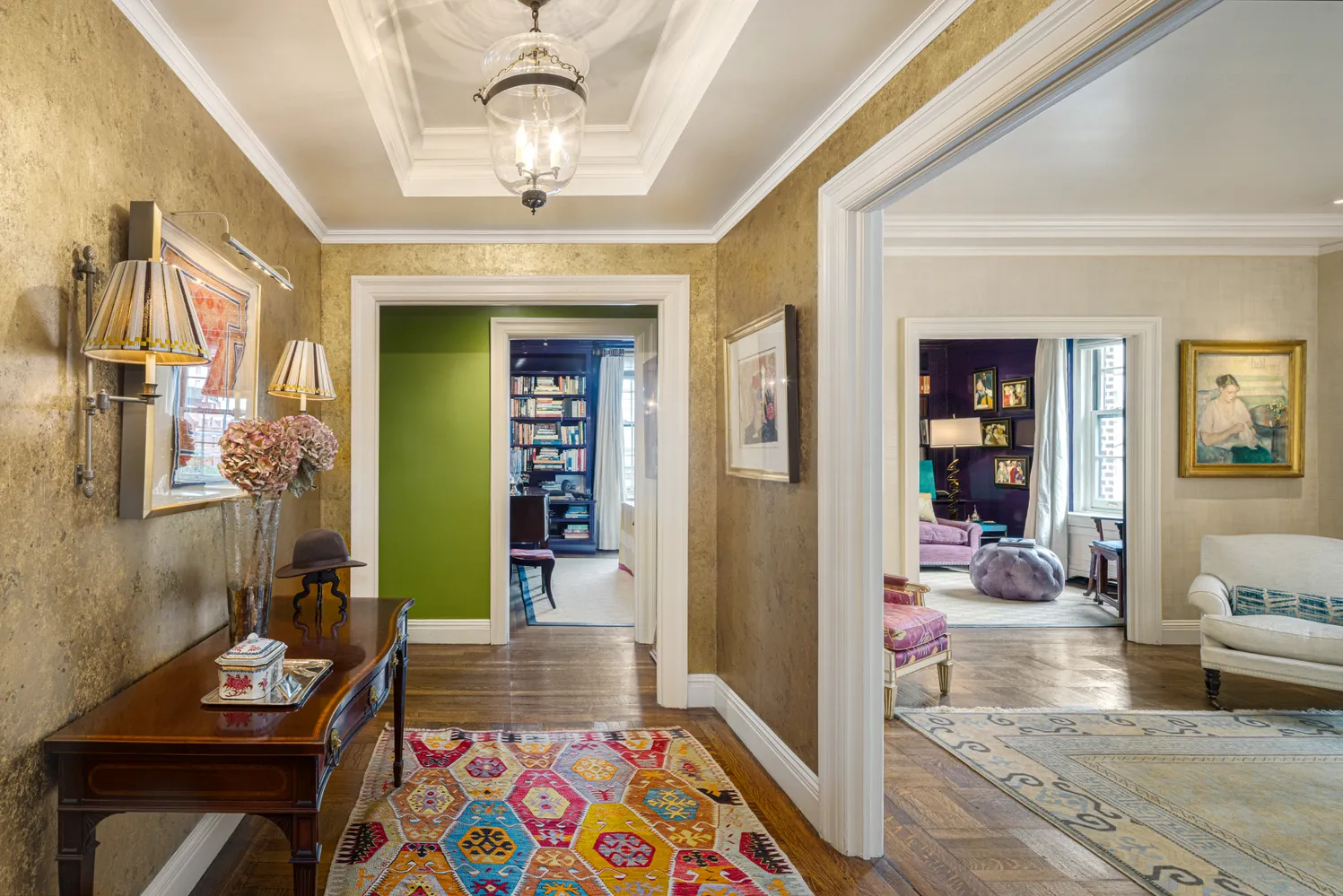 a view of living room with furniture and a chandelier