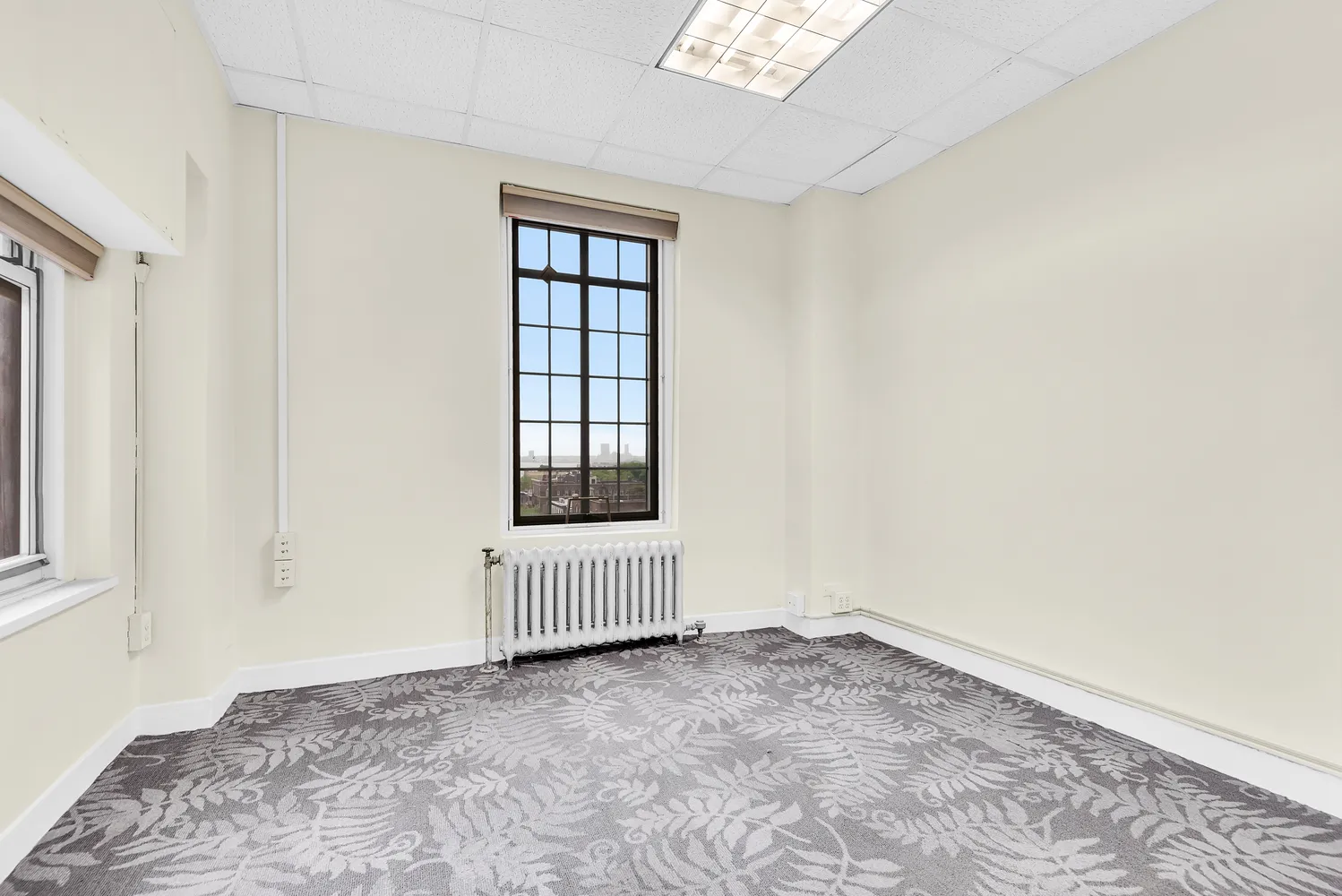 an empty room with windows