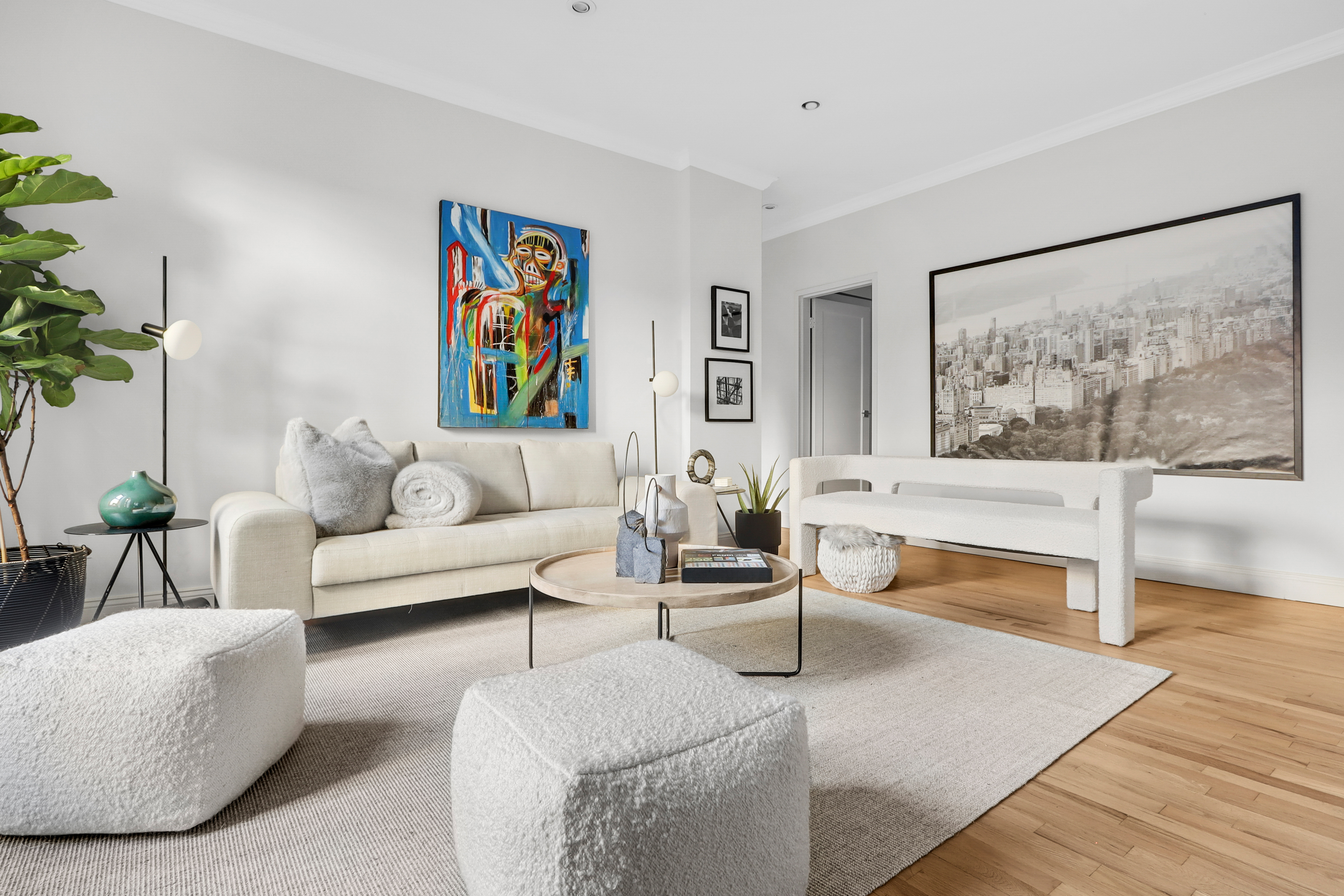 250 West 103rd Street, Unit 4A Manhattan, NY 10025 - Photo 1 of 14 a living room with furniture and a painting on the wall