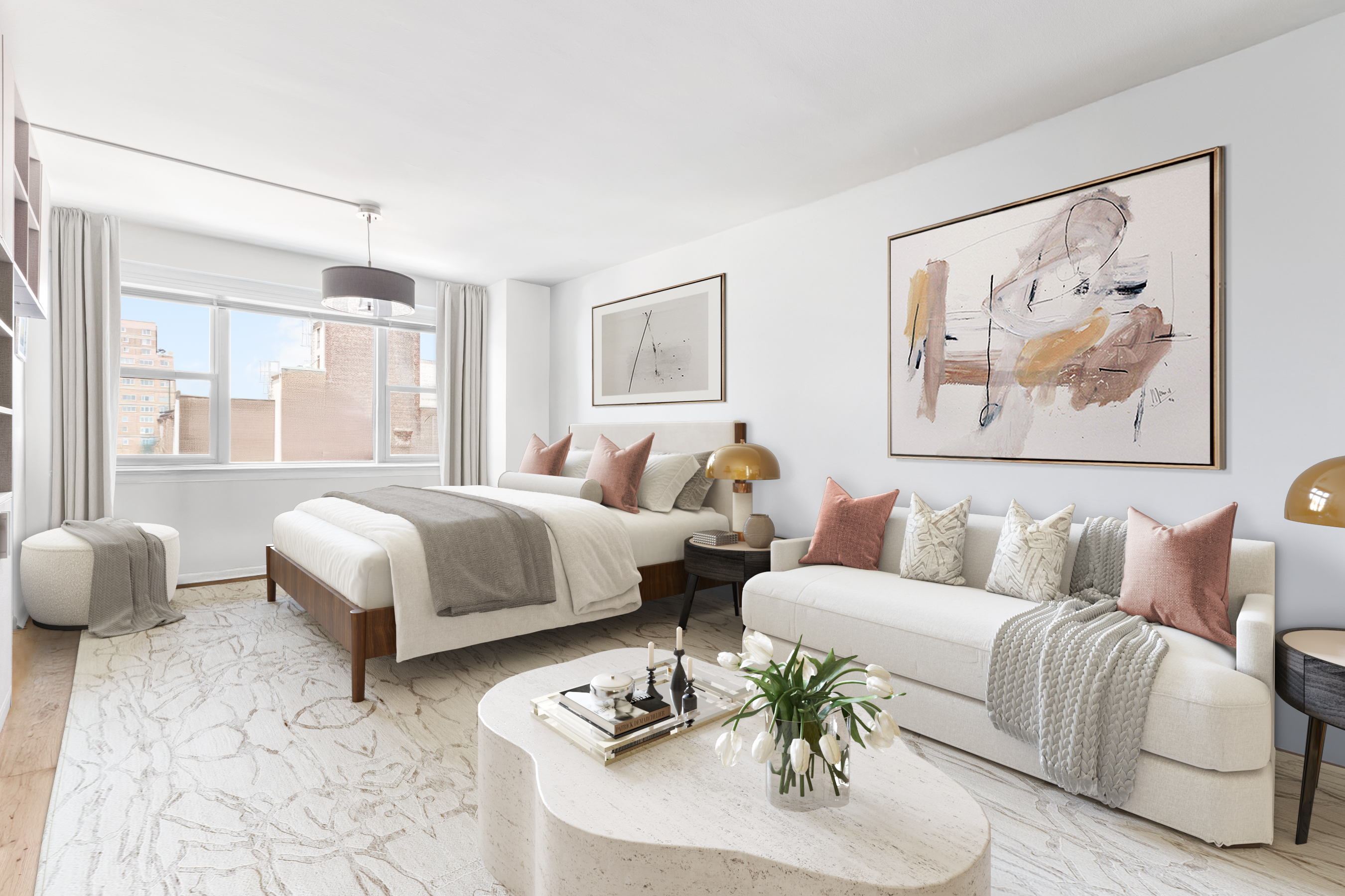 a bedroom with a bed and a couch