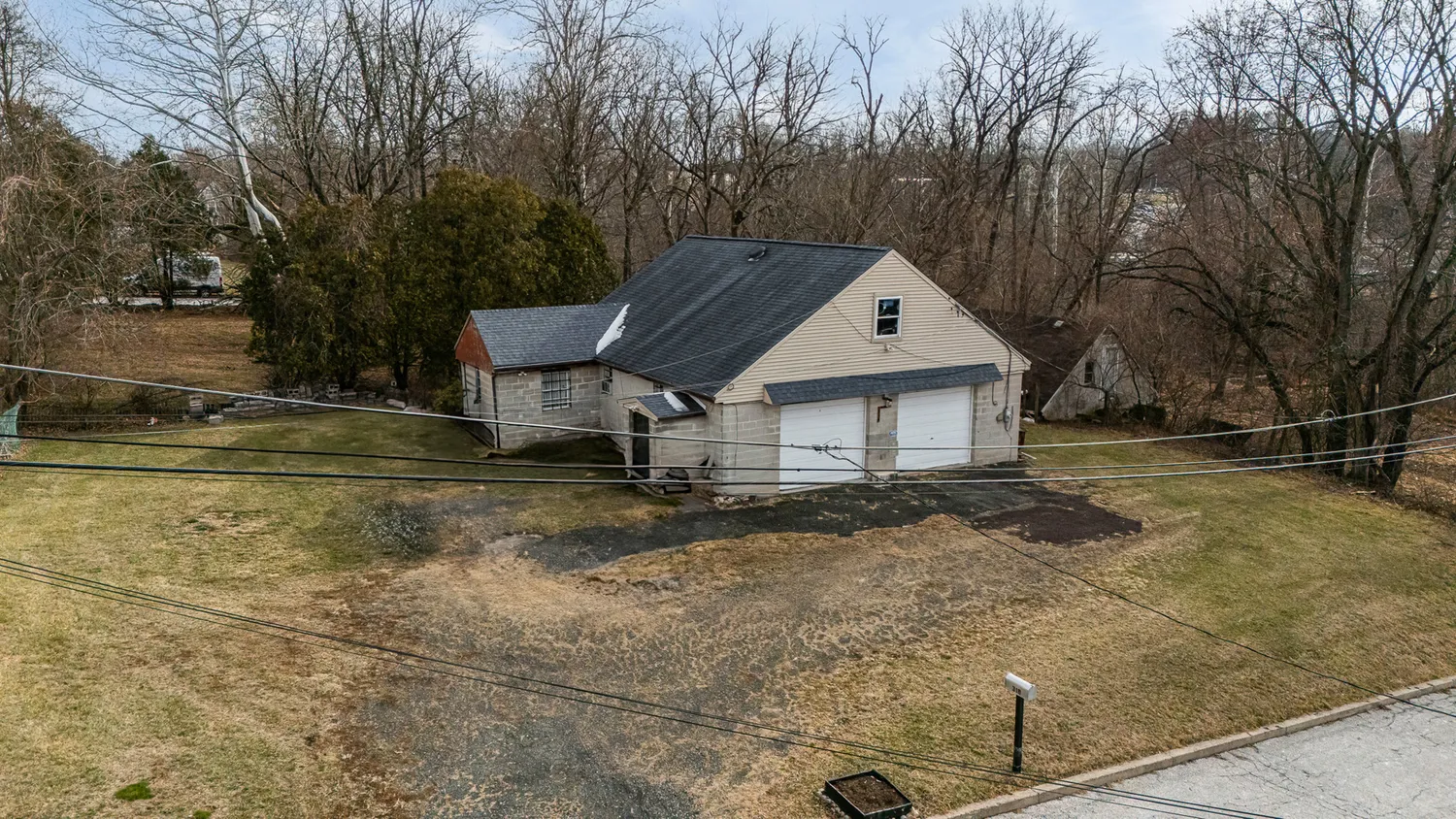 a house with trees in the background