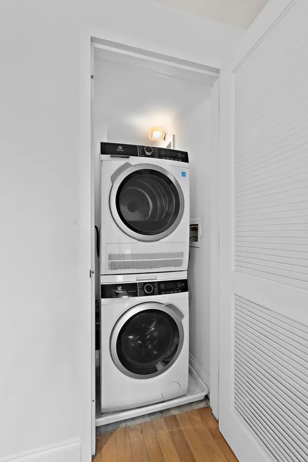 a utility room with dryer and washer