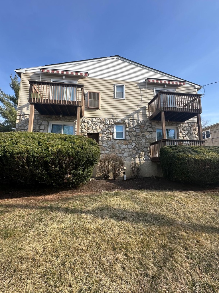 713 Willow Street, Unit 2A Lansdale, PA 19446 - Photo 2 of 15 a view of a house with a patio