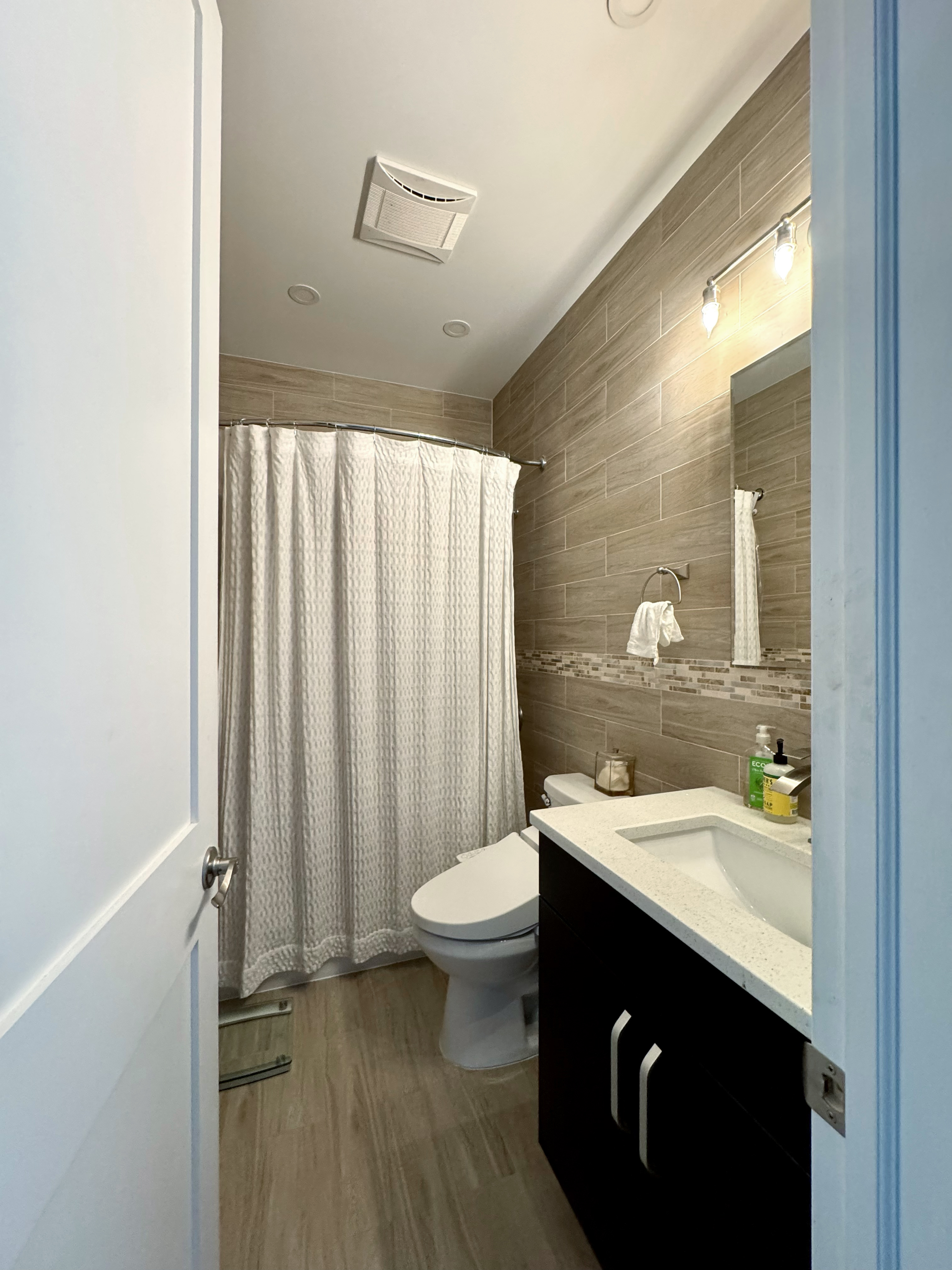 175 Luquer Street, Unit 4 Brooklyn, NY 11231 - Photo 17 of 21 a bathroom with a sink and a mirror