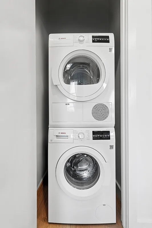 204 Smith Street, Unit 3R Brooklyn, NY 11201 - Photo 6 of 7 a utility room with dryer and washer